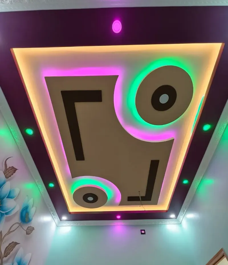 Gypsum false ceiling with a stepped border design Gypsum false ceiling with a stepped border design